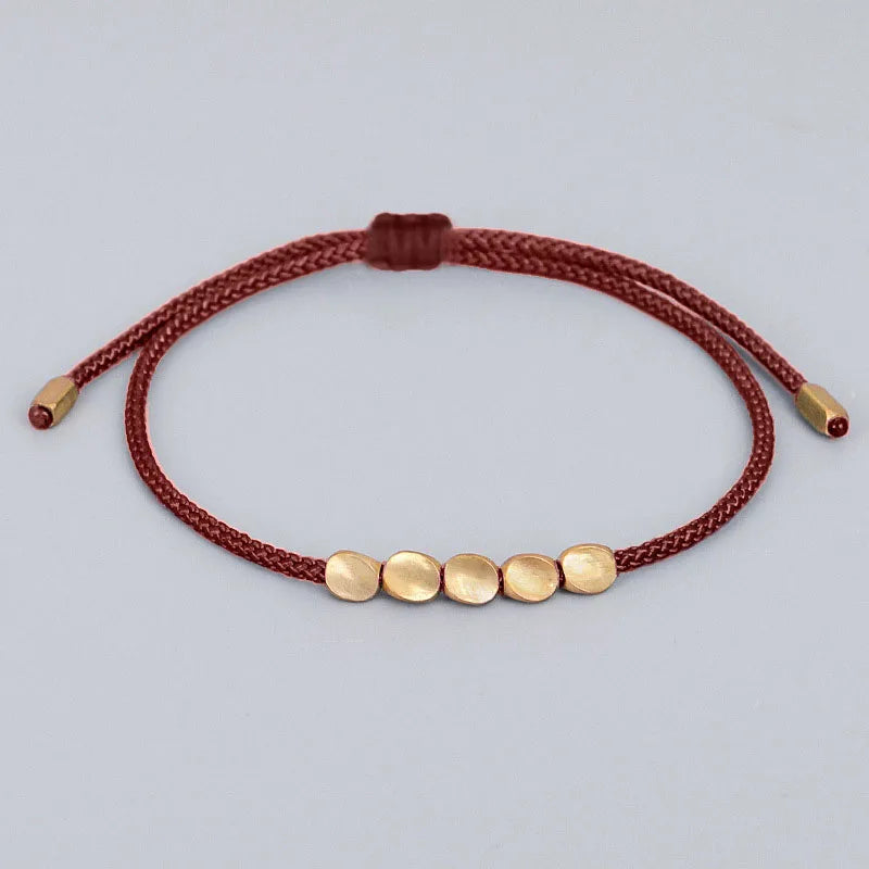 Bracelet de Chance tibétain mauve tissé à la main pour la chance et la protection