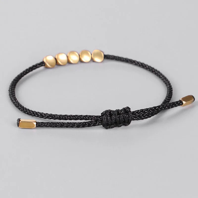 Bracelet de Chance tibétain noir tissé à la main pour la chance et la protection