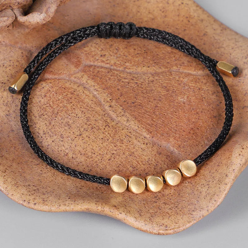 Bracelet de Chance tibétain noir tissé à la main pour la chance et la protection