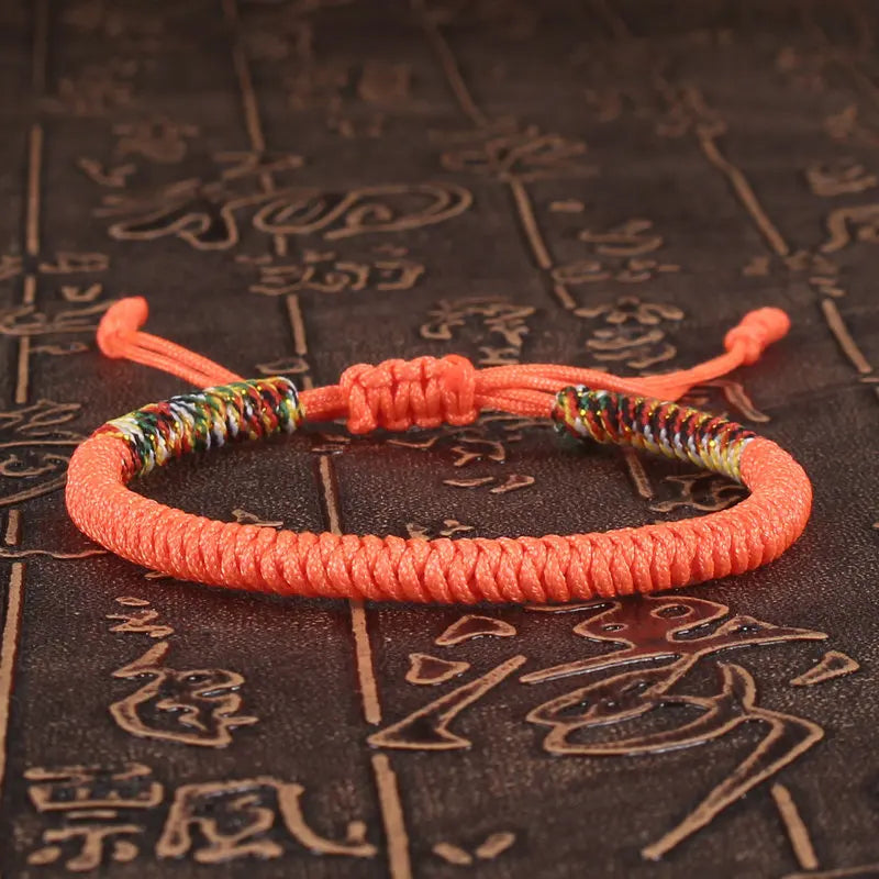 bracelet bouddhiste tibétain porte-bonheur orange tissé main